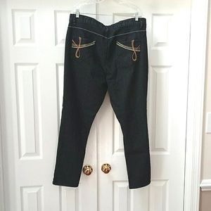 Black jeans with gold copper embellished pockets
